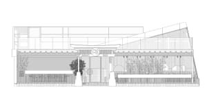 A modern architecture building facade made of glass and steel.