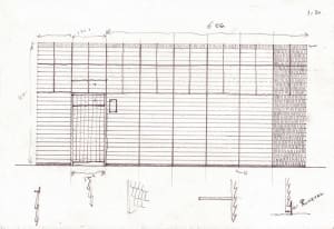 A detailed architectural drawing of a modern building facade featuring metal framing.
