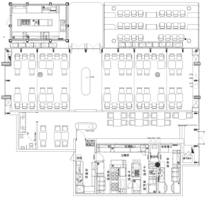 A detailed 2D architectural drawing of a restaurant floor plan with tables, chairs, and kitchen areas.