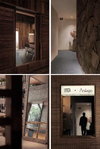 A modern, industrial interior featuring natural wood and stone materials.