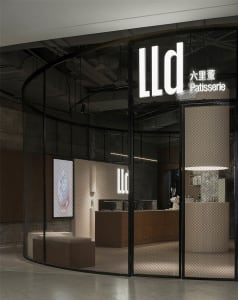 LLD Patisserie storefront with glass windows and signage