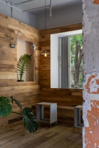 modern coffee shop interior with wooden walls and ceiling
