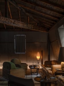 Modern living room with wooden furniture and a cozy atmosphere.