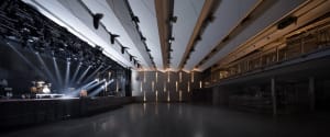 3D rendering of a modern concert hall interior with illuminated ceiling lights