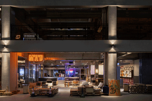 Concrete indoor space with industrial coffee shop bar
