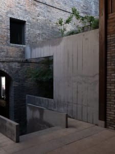 Concrete brick architectural entrance with a minimalist design