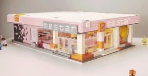 A small retail store modeled in miniature made of pink and orange LEGO bricks, with the name 'star' displayed on the front.