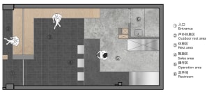 Floor plan of an office space featuring concrete, metal, and wood materials.