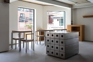 Industrial-style interior design featuring metallic furniture and minimalist decor.