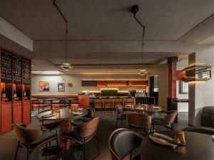 A modern restaurant interior with dark wood furniture and black chairs.