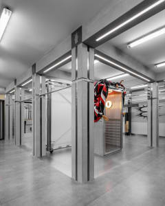 Industrial storefront with metallic aluminum frame and concrete flooring