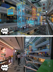 A vibrant and lively mall interior with colorful glass neon lights hanging from the ceiling.