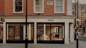 Modern storefront with large windows and wooden elements