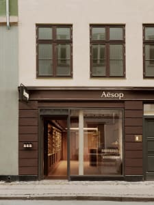 Aesop storefront with glass and wooden elements