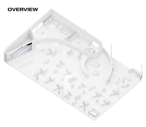 A 3D architectural model of an industrial medical center made of white plastic models.