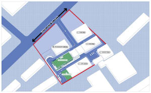 Detailed architectural blueprint of a retail space, including store locations, photography工作室, coffee shop, and garage.