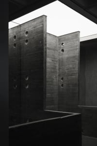 Concrete walls and ceiling with circular cutouts