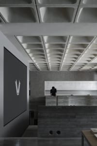 Modern interior design featuring concrete materials and minimalist aesthetic