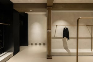 Industrial retail space featuring a metal clothing display