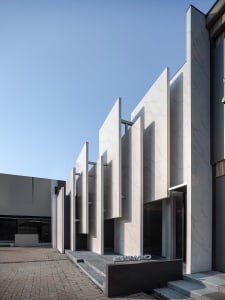 Modern exterior of a building with marble panels
