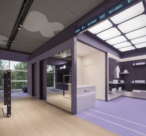 A modern purple fitness center with white paneling and hardwood floors.