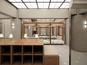 Modern retail storefront featuring concrete columns, marble floors, and wooden accents.