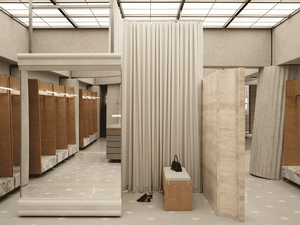 Modern wardrobe with marble texture and materials, featuring wooden furniture and a black handbag.
