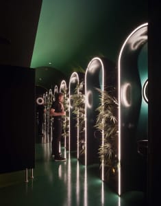 Industrial-style interior space with illuminated lighting features.