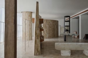 Modern minimalist retail store with stone and glass elements