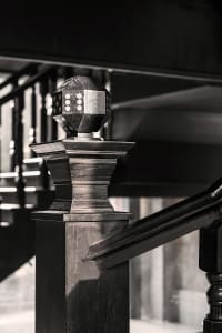A modern metal staircase with decorative elements