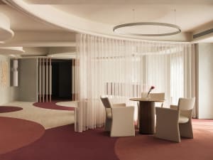 Modern, neutral-toned restaurant interior with minimalist seating arrangement and elegant decor.