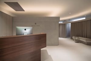 Modern reception area with marble counter and minimalist design