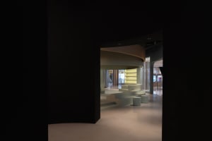 A modern exhibition space featuring mixed-media design elements.