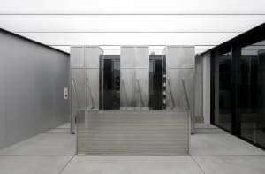 A modern entry hall with a steel structure.