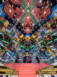 A colorful, modern retail storefront interior with glass walls.