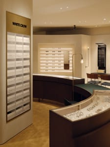 A modern optical shop featuring wooden and metallic materials.