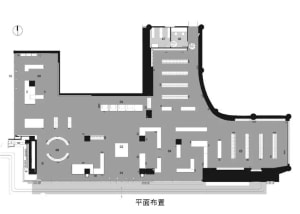 Modern office floor plan featuring concrete, glass, and metal materials