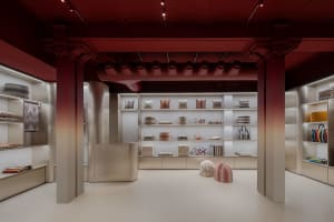 Interior design of a modern retail space featuring shelves with decorative objects.