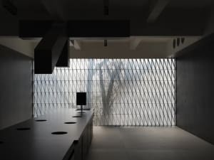 A modern commercial interior with a glass-frame window.