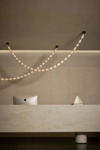 Modern, minimalist industrial-style reception desk made of metal