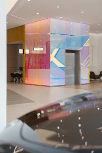 Modern retail storefront with glass walls.