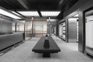 Modern retail showroom with dark metallic and reflective materials