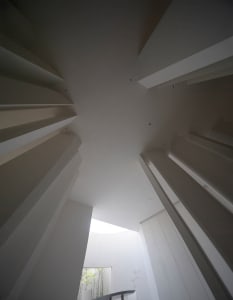 A minimalist interior design space featuring concrete elements