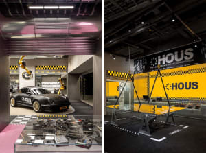 Modern industrial retail space featuring metallic design elements and a black and yellow color scheme.