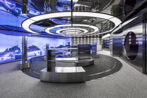 A modern technology center with metallic displays and a futuristic design.