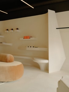 Minimalist storefront featuring a concrete structure with sleek, modern design
