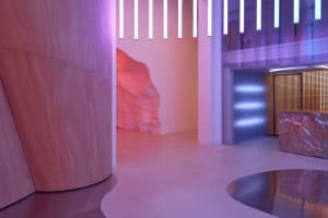 Modern interior design with metallic platforms and illuminated elements.