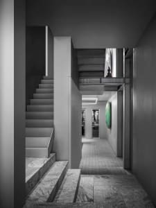Modern interior featuring marble stairs with minimalist design elements.