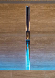 Modern swimming pool with blue light and wooden walls