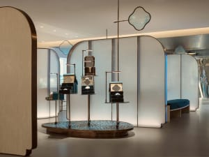 Modern retail storefront displaying metal and glass elements.